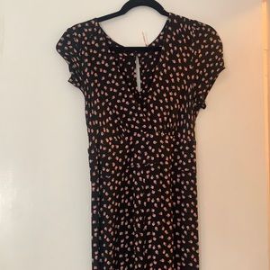 Free people black and pink floral V neck jumpsuit